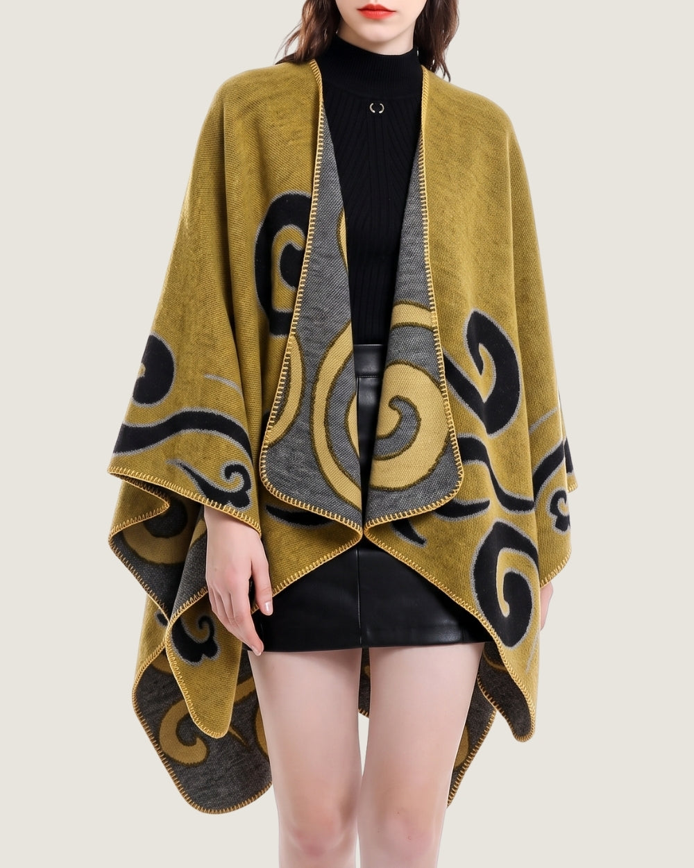 poncho-cape-femme-motif-spirales-jaune