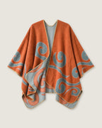 poncho-cape-femme-motif-spirales-orange-seul
