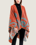 poncho-cape-femme-motif-spirales-orange