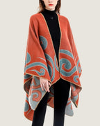 poncho-cape-femme-motif-spirales-orange