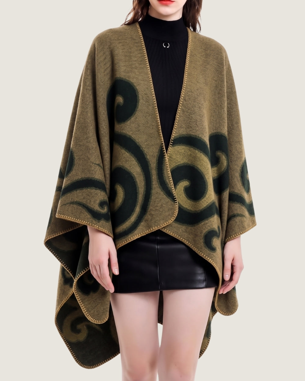 poncho-cape-femme-motif-spirales-vert
