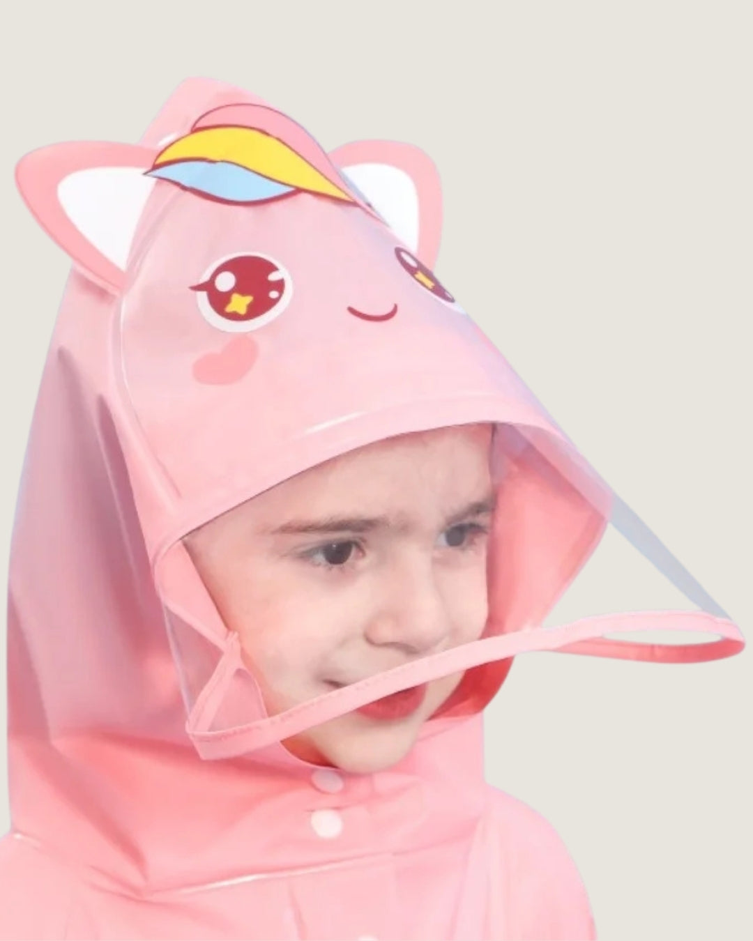 poncho-de-pluie-enfant-fille-licorne-impermeable-capuche-closeup-visiere