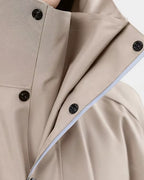 poncho-de-pluie-impermeable-capuche-pour-scooter-et-velo-beige-boutons
