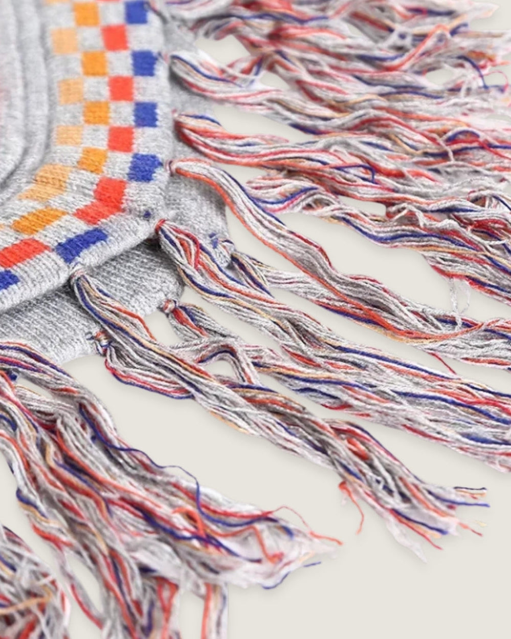 poncho-peruvien-multicolore-raye-franges-closeup